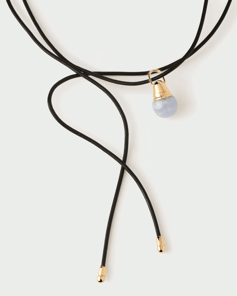 Black leather adjustable choker bow necklace that can be customized adding pendants